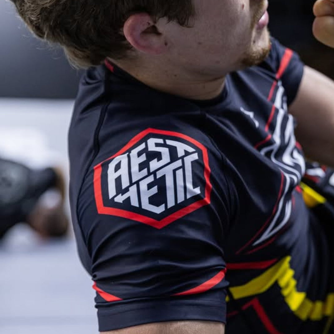 AESTHETIC Moto Owen Jones Short Sleeve BJJ Rashguard – Black side view