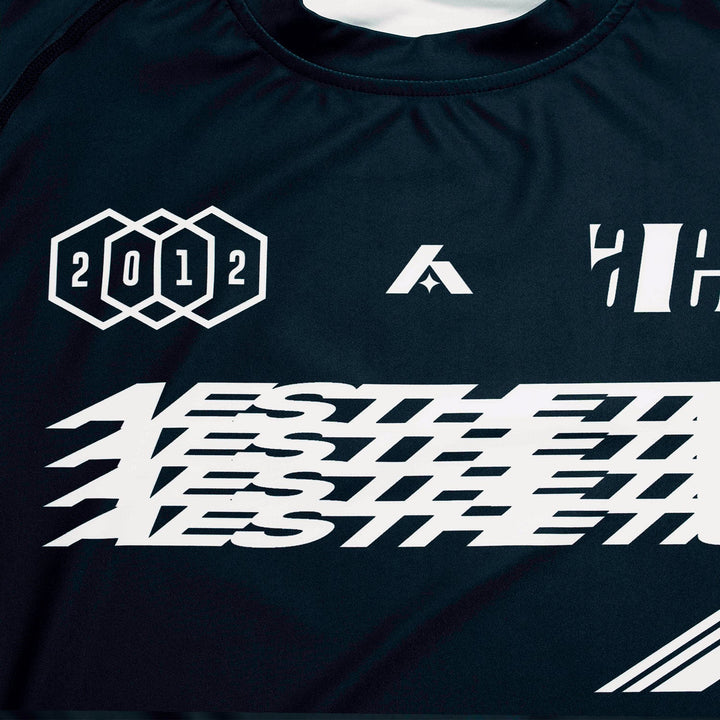 AESTHETIC Axis Short Sleeve Rashguard - Black front close up details