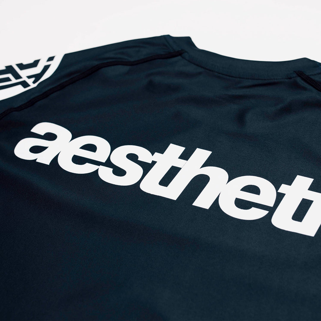AESTHETIC Axis Short Sleeve Rashguard - Black back close up details