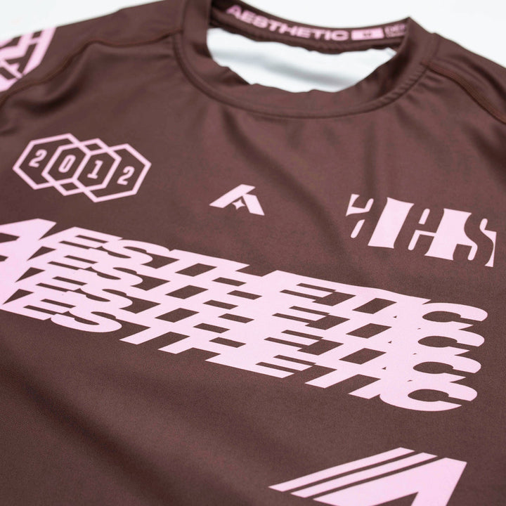 AESTHETIC Axis Short Sleeve Rashguard - Chestnut Brown close up