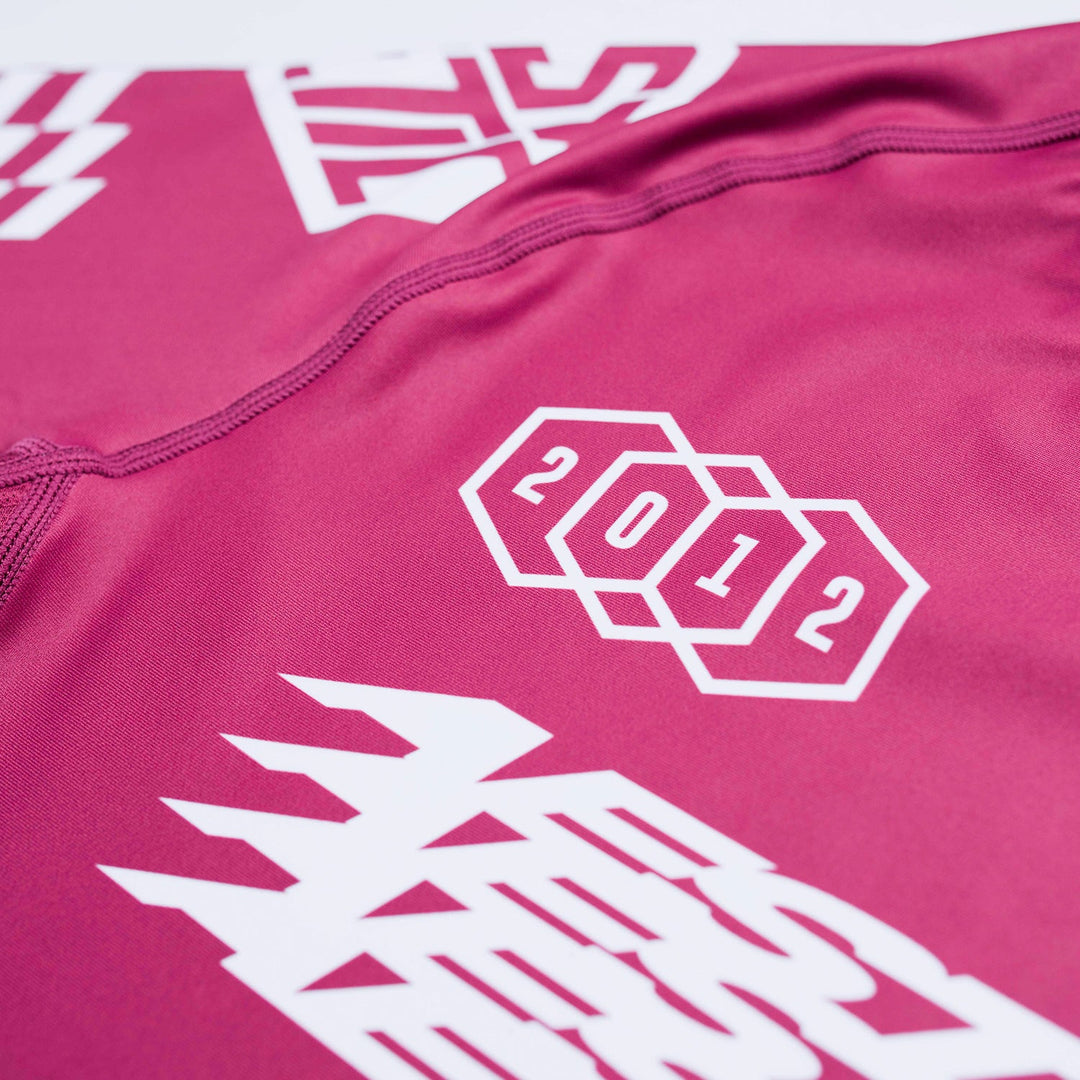 AESTHETIC Axis Short Sleeve Rashguard - Ruby Red side close up