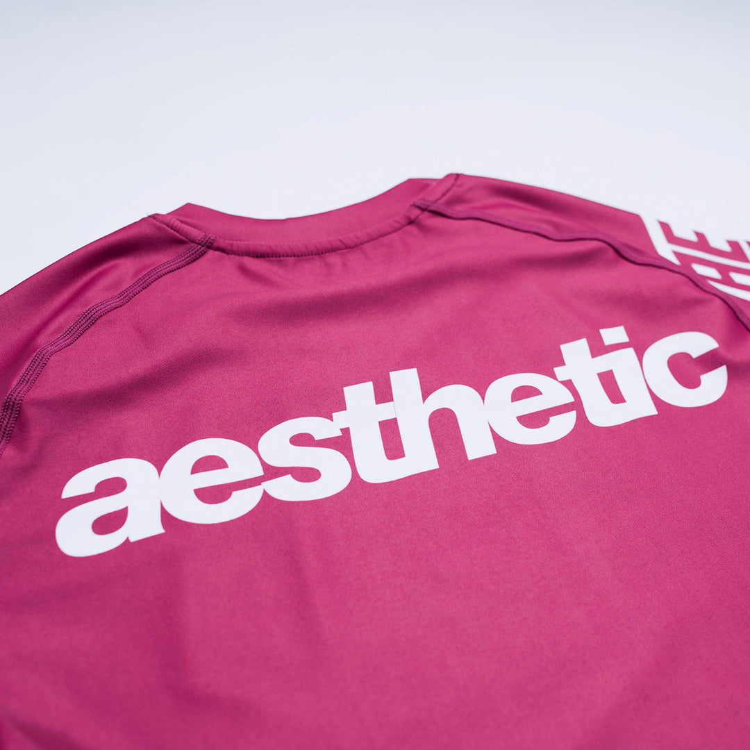 AESTHETIC Axis Short Sleeve Rashguard - Ruby Red back close up details