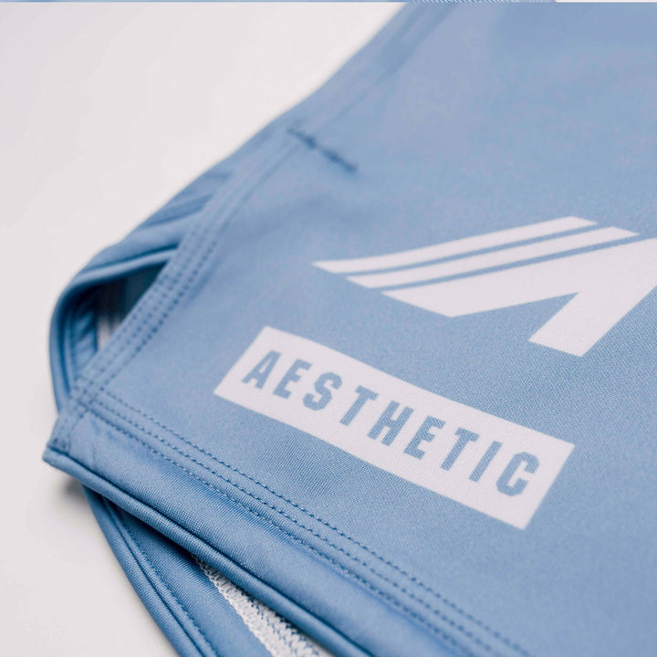 AESTHETIC Axis Combat Shorts – Steel Grey logo details