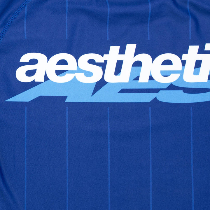 AESTHETIC UK Long Sleeve Ranked Rashguard 2026 Blue - logo close up