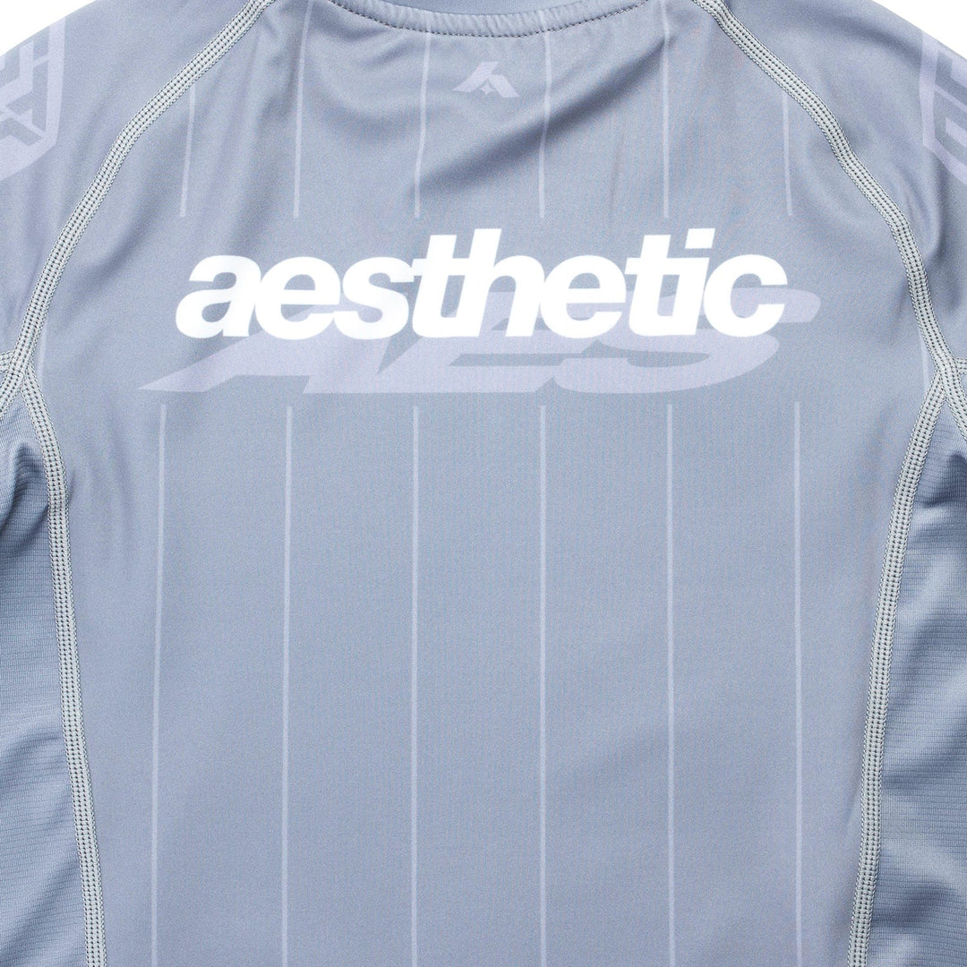 AESTHETIC UK Youth Short Sleeve Ranked Rashguard 2026 Grey - back logo