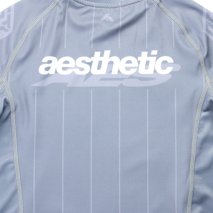 AESTHETIC UK Youth Short Sleeve Ranked Rashguard 2026 Grey - back logo