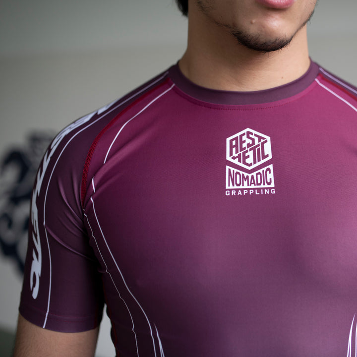 AESTHETIC Merlot ADCC 2026 Jozef Chen Short Sleeve Rashguard - chest close up