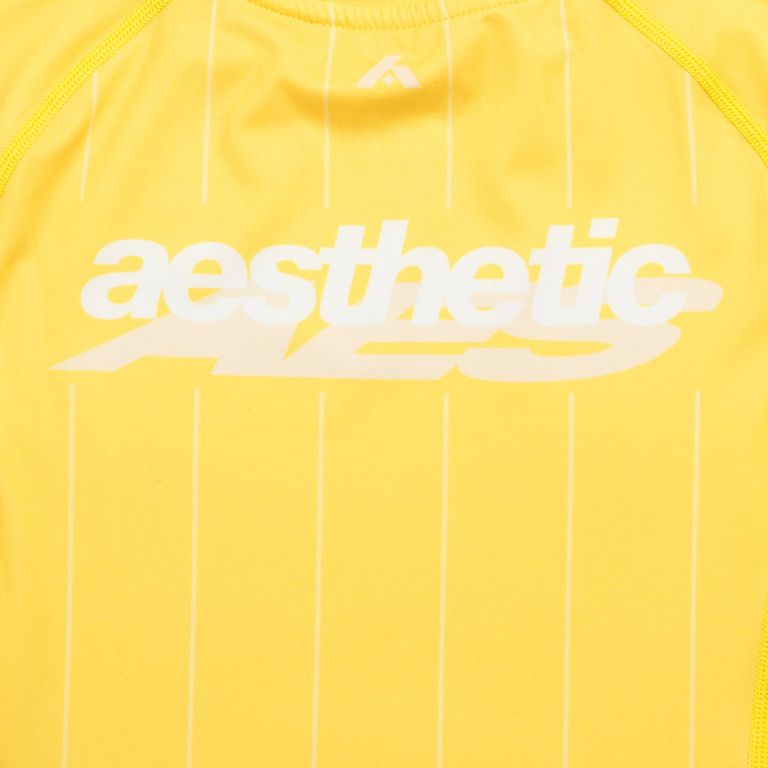 AESTHETIC UK Youth Short Sleeve Ranked Rashguard 2026 Yellow - back logo